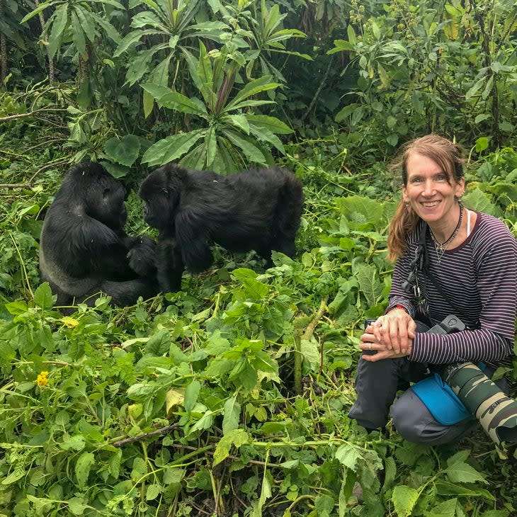 <span class="article__caption">Michelle loved wildlife and being able to advocate for their conservation through her work as a professional wildlife photographer. Here, she is shown photographing mountain gorillas in Rwanda in March 2019 during one of the many trips she took there. </span> (Photo: Courtesy of Dan Gottas)