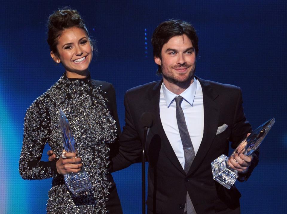 Nina Dobrev (L) and Ian Somerhalder, winners of the Favorite On Screen Chemistry award for "The Vampire Diaries," speak onstage at The 40th Annual People's Choice Awards at Nokia Theatre L.A. Live on January 8, 2014 in Los Angeles, California