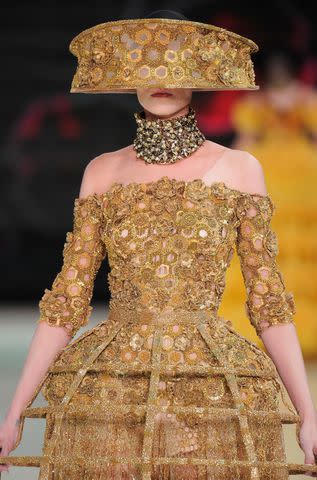 <p>Chris Moore/Catwalking/Getty</p> Alexander McQueen Spring/Summer 2013 runway.