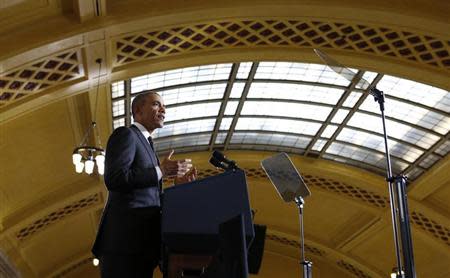 U.S. President Barack Obama speaks at Union Depot in St. Paul, Minnesota February 26, 2014. REUTERS/Kevin Lamarque