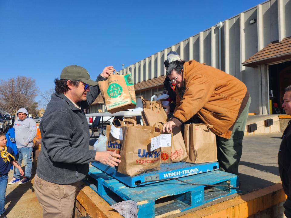 More than 50 area Boy Scout troops work to deliver food donations to the High Plains Food Bank Distribution Center Saturday morning during the 2023 Scouting for Food drive.
