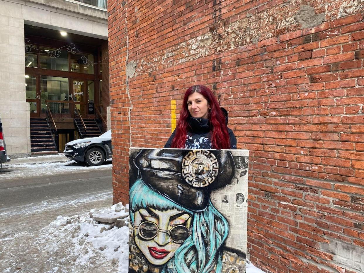 Maxime Gagnon Bergeron travelled from Jonquière, Que., to Montreal to retrieve seven of her paintings.   (Joe Bongiorno/CBC - image credit)