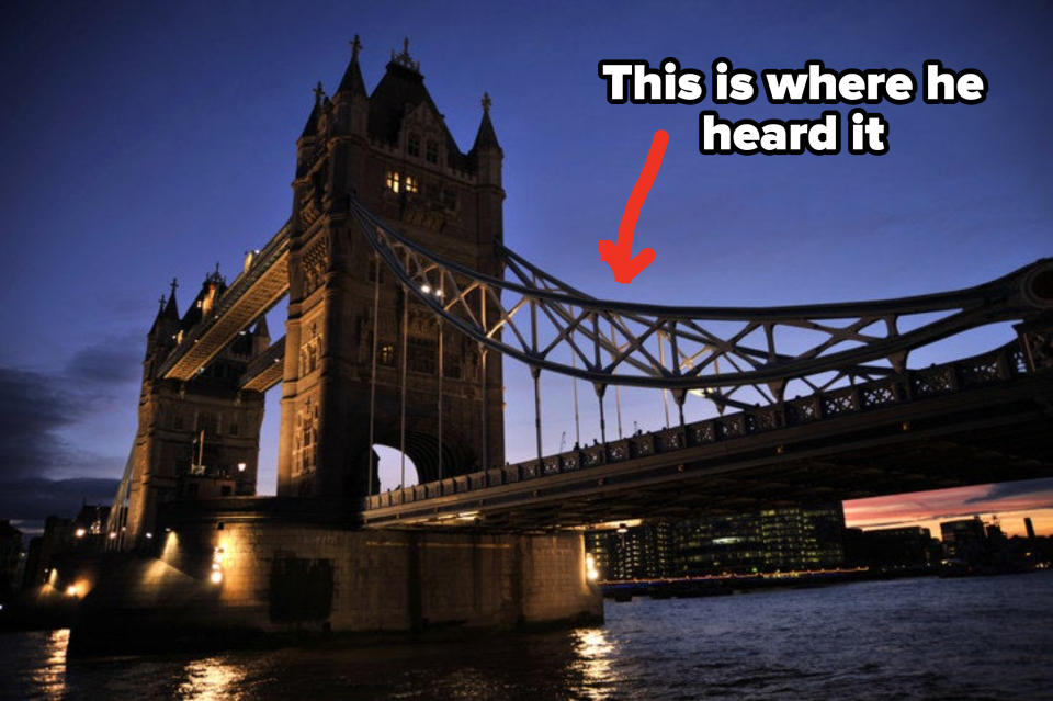 Tower bridge illuminated at night on the river Thames in London, England, UK labeled, "He heard it here"