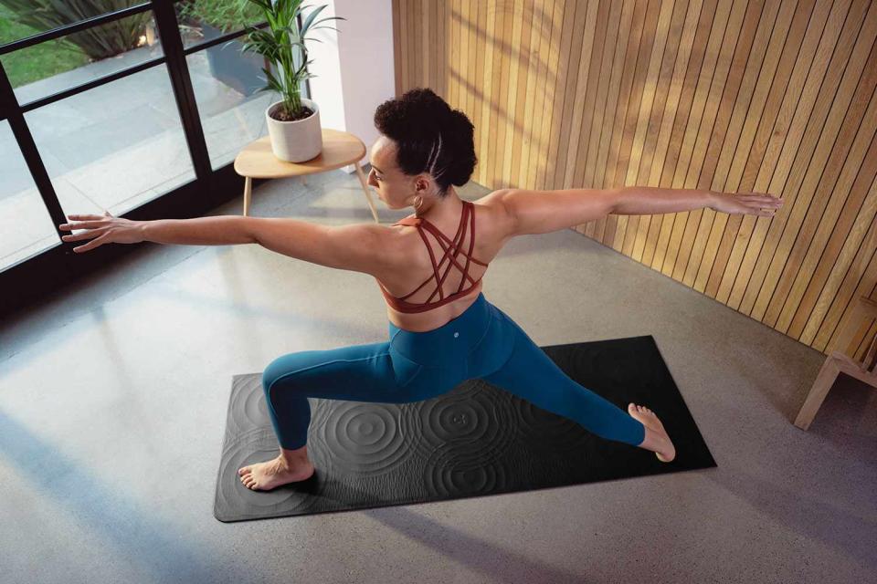 <p>Give your practice a serious upgrade with Lululemon's new Take Form yoga mat. The raised, water droplet-inspired circles act as a guide for where to place hands and feet as you go through movements, and the sustainably-sourced rubber provides a strong grip.</p> <p>Plus, at 5mm, the thick mat adds plenty of cushion, key for apartment-dwellers trying to get in a yoga session or a HIIT workout without making enemies of their downstairs neighbors. </p> <p><a href="https://shop.lululemon.com/p/yoga-mats/Take-Form-Yoga-Mat-5mm/_/prod10370187?color=47749&sz=ONESIZE" rel="nofollow noopener" target="_blank" data-ylk="slk:Lululemon's Take Form yoga mat, $128;elm:context_link;itc:0;sec:content-canvas" class="link ">Lululemon's Take Form yoga mat, $128</a></p>