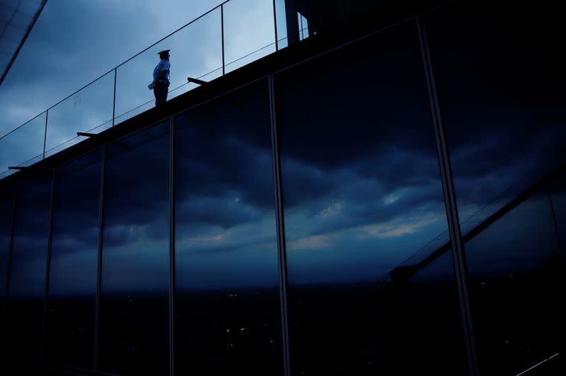 The Wider Image: Postcards from Tokyo: light and shadow ahead of pandemic Olympics