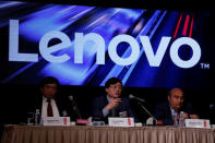 (L-R) Lenovo Executive Vice President and CFO Wong Wai-ming, Chairman and CEO Yang Yuanqing and Corporate President and COO Gianfranco Lanci attend a news conference on the company's annual results in Hong Kong May 26, 2016. REUTERS/Bobby Yip