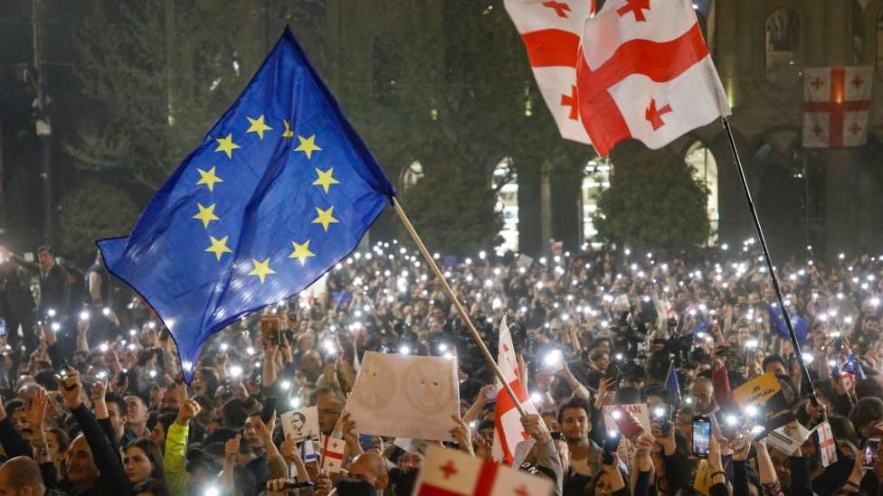 Georgian opposition party supporters attend a protest