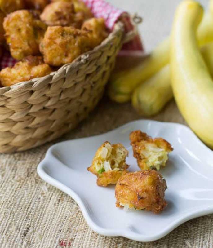 <p>Spicy Southern Kitchen</p><p>Yellow squash helps keep the interior of these delectable bites super moist and gives them some flavor and the exterior of the cornmeal batter fries up crispy. These Squash Puppies are a great way to use up some of your summer produce.</p><p><strong>Get the recipe: <a href="https://spicysouthernkitchen.com/squash-puppies/" rel="nofollow noopener" target="_blank" data-ylk="slk:Squash Puppies;elm:context_link;itc:0;sec:content-canvas" class="link ">Squash Puppies</a></strong></p>
