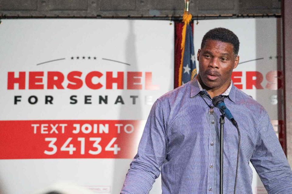 Heisman Trophy winner and Republican candidate for US Senate Herschel Walker speaks at a rally on May 23, 2022 in Athens, Georgia. Tomorrow is the Primary Election Day in the state of Georgia.