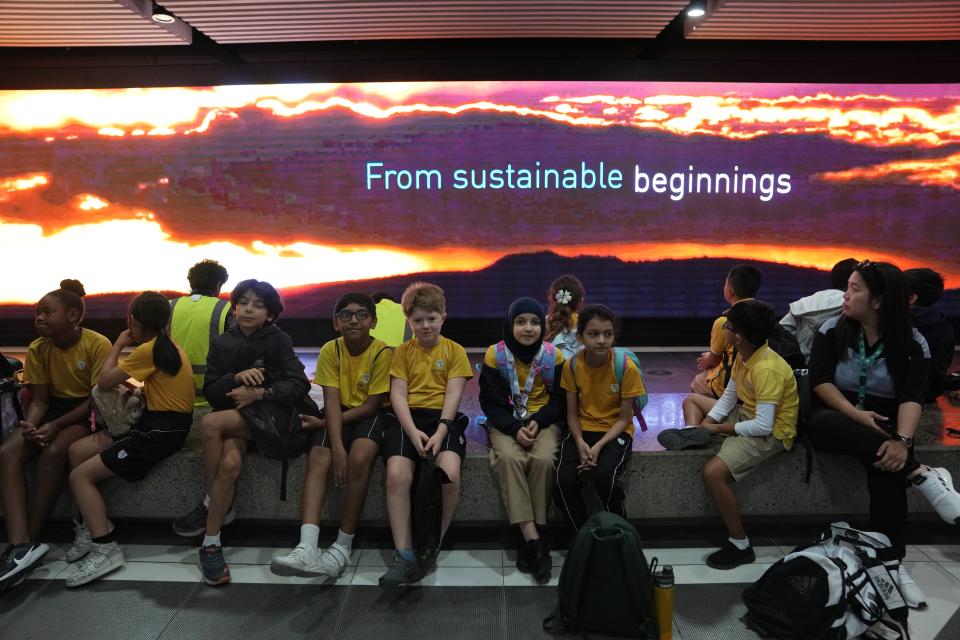 Students visit Masdar City near Abu Dhabi, United Arab Emirates, as Dubai hosts the COP28 U.N. Climate Summit, Friday, Dec. 8, 2023. (AP Photo/Kamran Jebreili)