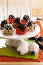 <p>Dish up some devilish treats with these eyeball brownie cake pops. </p><p><a rel="nofollow noopener" href="https://www.womansday.com/food-recipes/food-drinks/recipes/a11018/brownie-pop-eyeballs-recipe-122457/" target="_blank" data-ylk="slk:Get the recipe.;elm:context_link;itc:0;sec:content-canvas" class="link "><strong>Get the recipe.</strong></a></p>