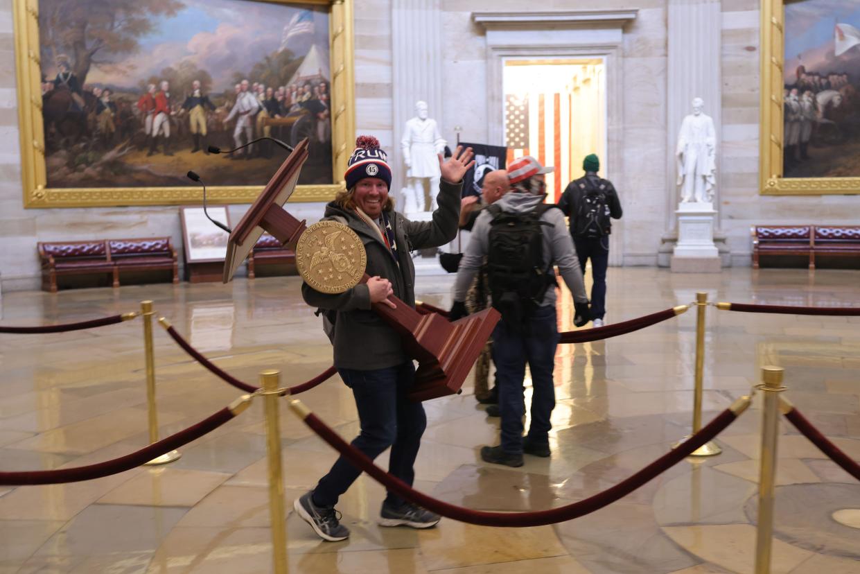 Protesters enter the U.S. Capitol Building on January 06, 2021, in Washington, DC. Congress held a joint session today to ratify President-elect Joe Biden's 306-232 Electoral College win over President Donald Trump. A group of Republican senators said they would reject the Electoral College votes of several states unless Congress appointed a commission to audit the election results.