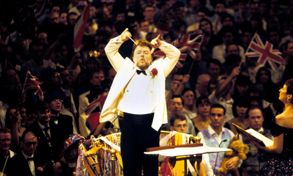 <span>Andrew Davis on the podium at the Last Night of the Proms at the Royal Albert Hall, London, in 1996.</span><span>Photograph: David Redfern/Redferns</span>
