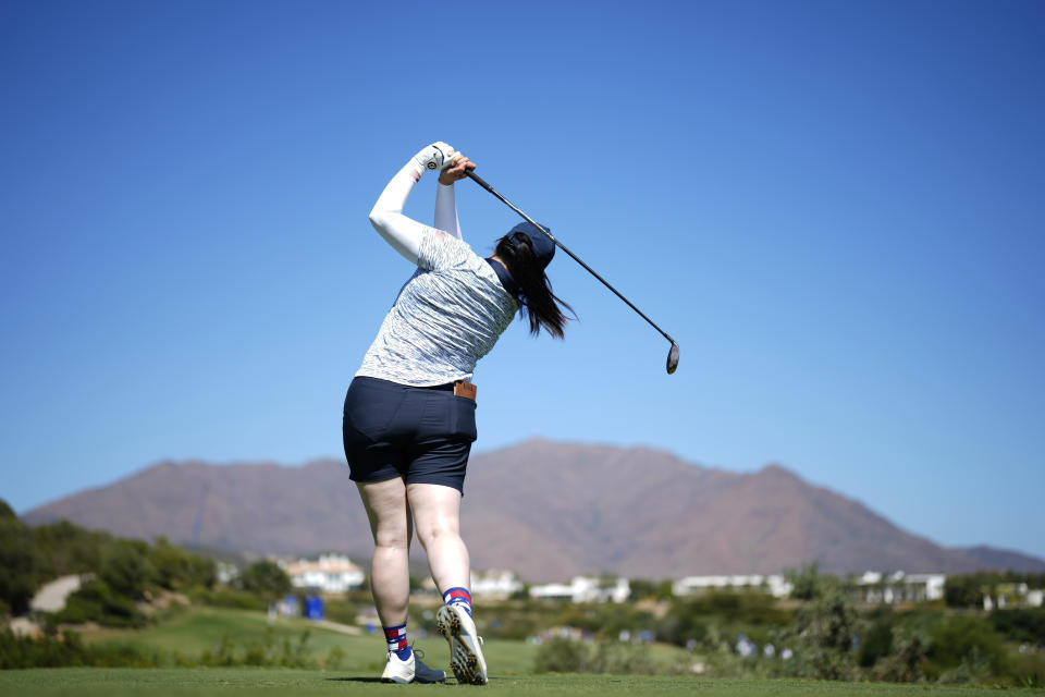 United States' Angel Yin plays her tee shot from the 2nd teen during her afternoon fourball match at the Solheim Cup golf tournament in Finca Cortesin, near Casares, southern Spain, Saturday, Sept. 23, 2023. Europe play the United States in this biannual women's golf tournament, which played alternately in Europe and the United States. (AP Photo/Bernat Armangue)