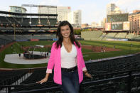 Baltimore Orioles radio and TV announcer Melanie Newman poses for a photograph before a baseball game at Oriole Park at Camden Yards, Tuesday, Sept. 28, 2021, in Baltimore. Newman made history earlier this season when she was part of Major League Baseball's first all-women's broadcast. On Wednesday, the Orioles announcer will receive a bigger national stage when she teams up with Jessica Mendoza on ESPN. (AP Photo/Nick Wass)