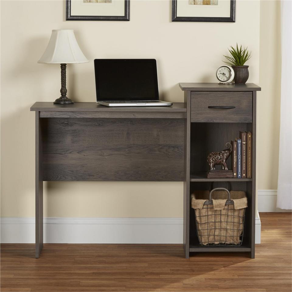 You can select from four different finishes, including weathered oak or walnut. It includes an adjustable shelf and a fixed shelf for extra space to store supplies. <a href="https://fave.co/3jrZpoF" target="_blank" rel="noopener noreferrer">Find it for $79 at Walmart</a>.