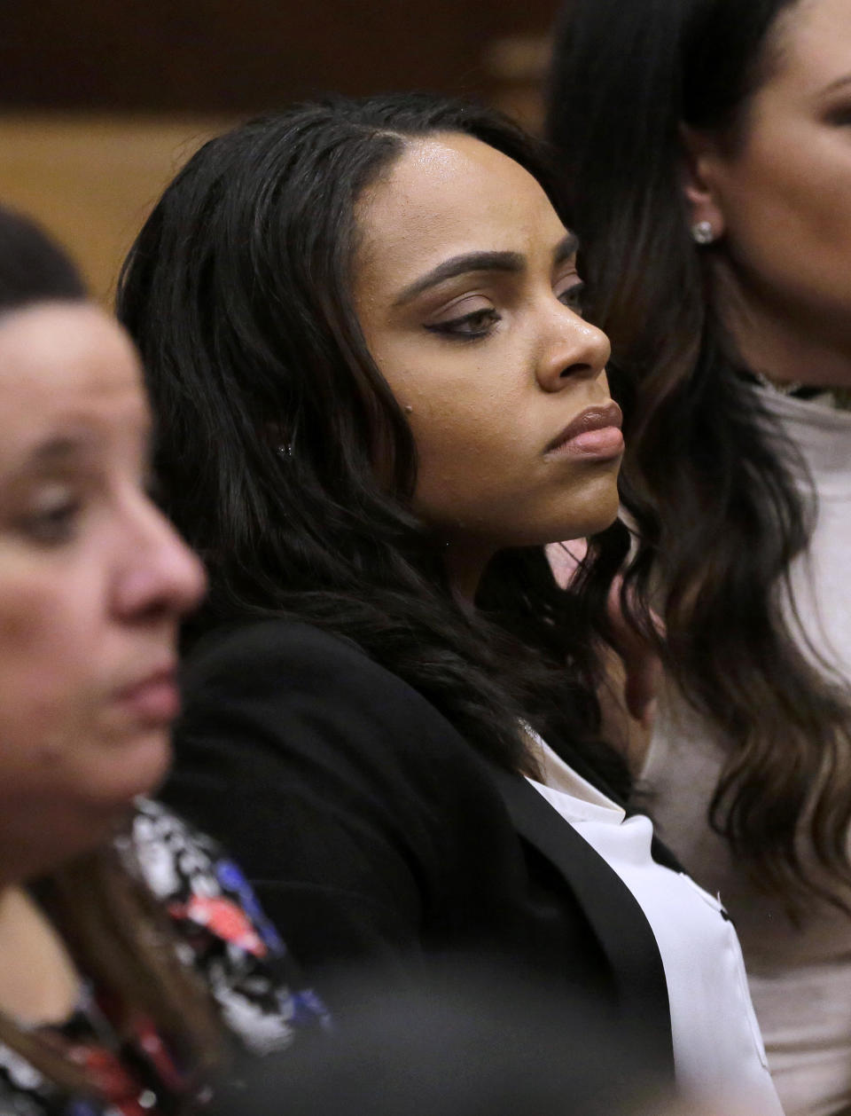 Shayanna Jenkins-Hernandez, fiancee of former New England Patriots tight end Aaron Hernandez, sits in the courtroom during the trial for Hernandez at Suffolk Superior Court, Thursday, April 6, 2017, in Boston. Hernandez is on trial for the July 2012 killings of Daniel de Abreu and Safiro Furtado who he encountered in a Boston nightclub. The former NFL player is already serving a life sentence in the 2013 killing of semi-professional football player Odin Lloyd. (AP Photo/Steven Senne, Pool)