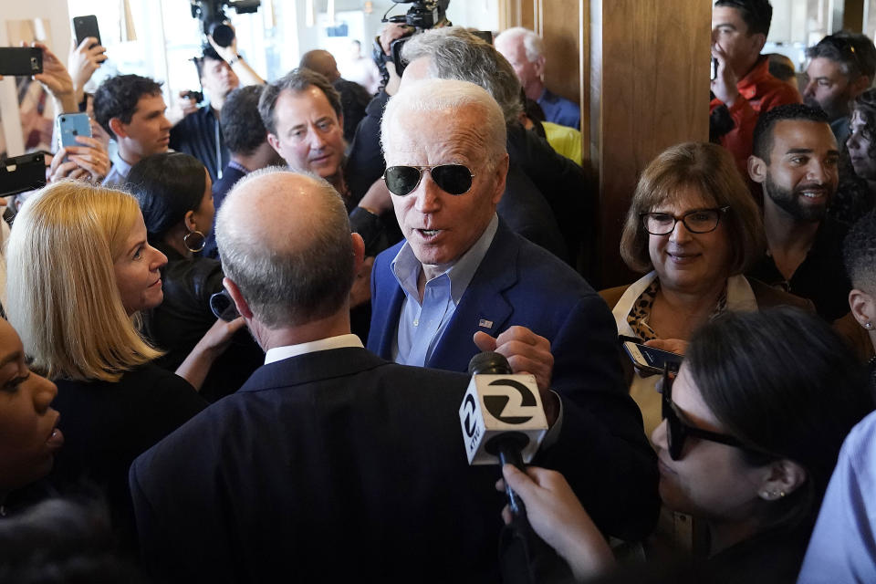 Democratic presidential candidate former Vice President Joe Biden greets customers at the Buttercup Diner during a campaign stop in Oakland, Calif., Tuesday, March 3, 2020. (AP Photo/Tony Avelar)