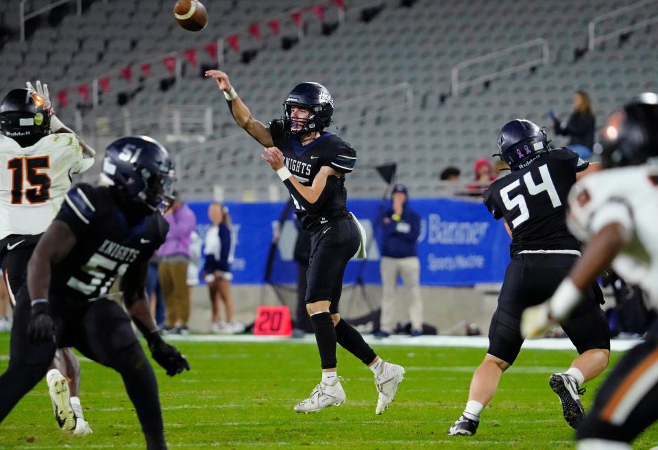 December 1, 2023; Tempe, Ariz.; USA; Higley quarterback Gunner Fagrell (15) throws a screen against Desert Edge during the 5A State Championship at Mountain America Stadium.