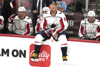 Washington Capitals left wing Alex Ovechkin (8) takes a break during a timeout during the third period of an NHL hockey game against the Florida Panthers, Thursday, Feb. 8, 2024, in Sunrise, Fla. (AP Photo/Jim Rassol)