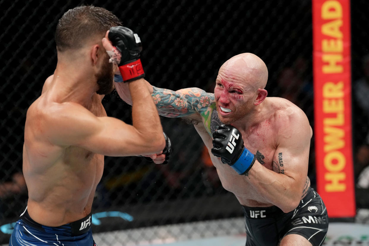 AUSTIN, TEXAS - JUNE 18: (R-L) Josh Emmett punches Calvin Kattar in a featherweight fight during the UFC Fight Night event at Moody Center on June 18, 2022 in Austin, Texas. (Photo by Josh Hedges/Zuffa LLC)