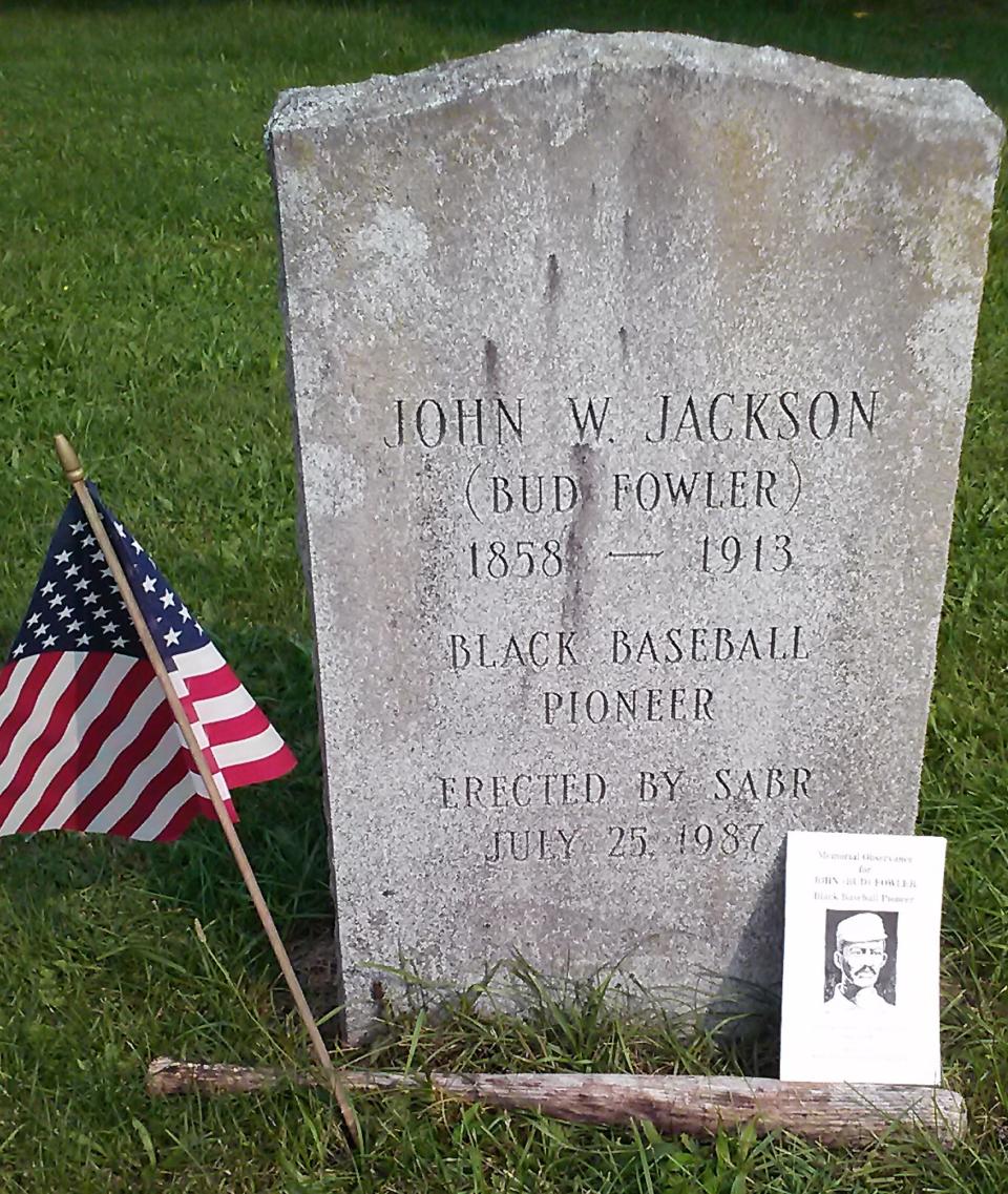 Bud Fowler's gravestone in the Oak View Cemetery in Frankfort, New York. Pictured bottom right is a program from the stone's 1987 dedication ceremony. Photo taken Wednesday, Sept. 16, 2020.