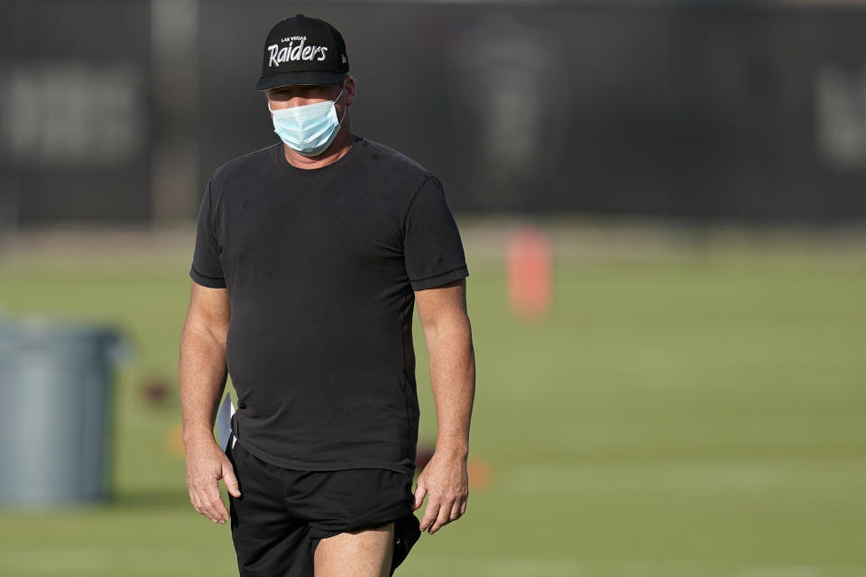 Las Vegas Raiders head coach Jon Gruden watches during an NFL football training camp practice Thursday, Aug. 13, 2020, in Henderson, Nev. (AP Photo/John Locher, Pool)