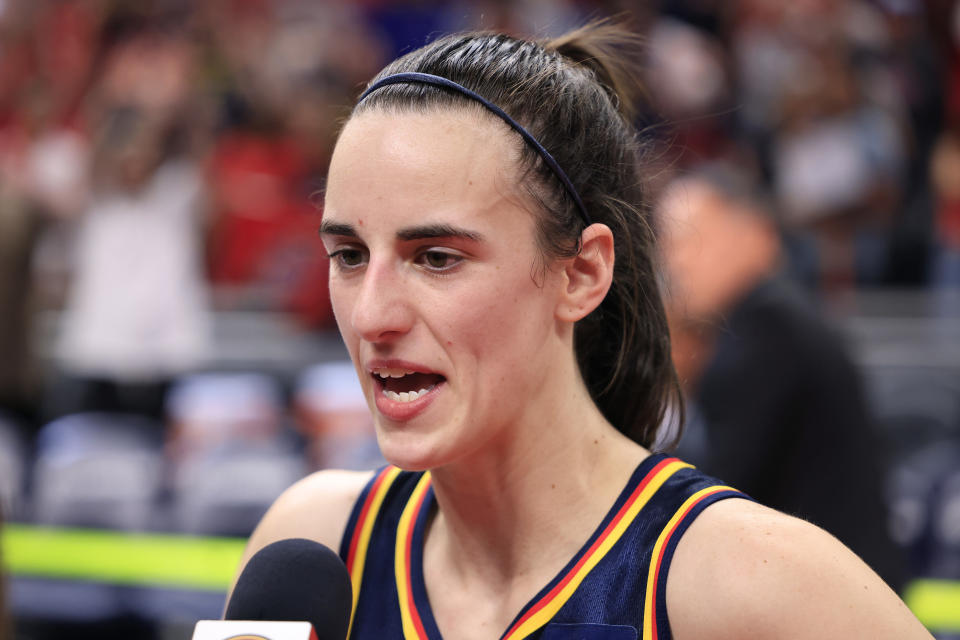 INDIANAPOLIS, INDIANA - SEPTEMBER 15: Caitlin Clark #22 of the Indiana Fever is interviewed after the game against the Dallas Wings at Gainbridge Fieldhouse on September 15, 2024 in Indianapolis, Indiana. NOTE TO USER: User expressly acknowledges and agrees that, by downloading and or using this photograph, User is consenting to the terms and conditions of the Getty Images License Agreement. (Photo by Justin Casterline/Getty Images)