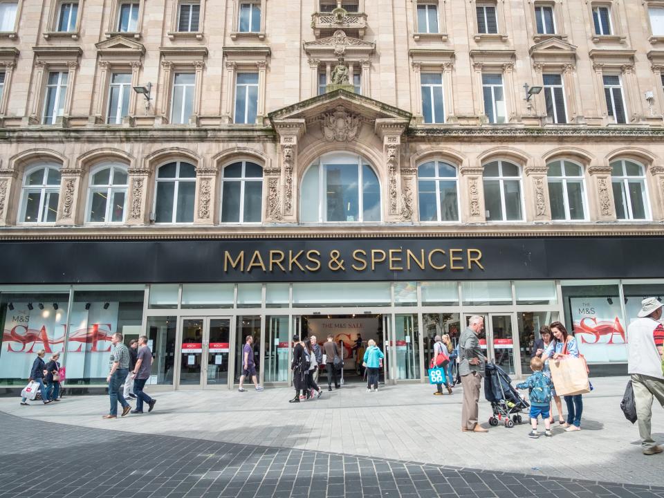 Shoppers outside a Marks and Spencer store in Liverpool, England.