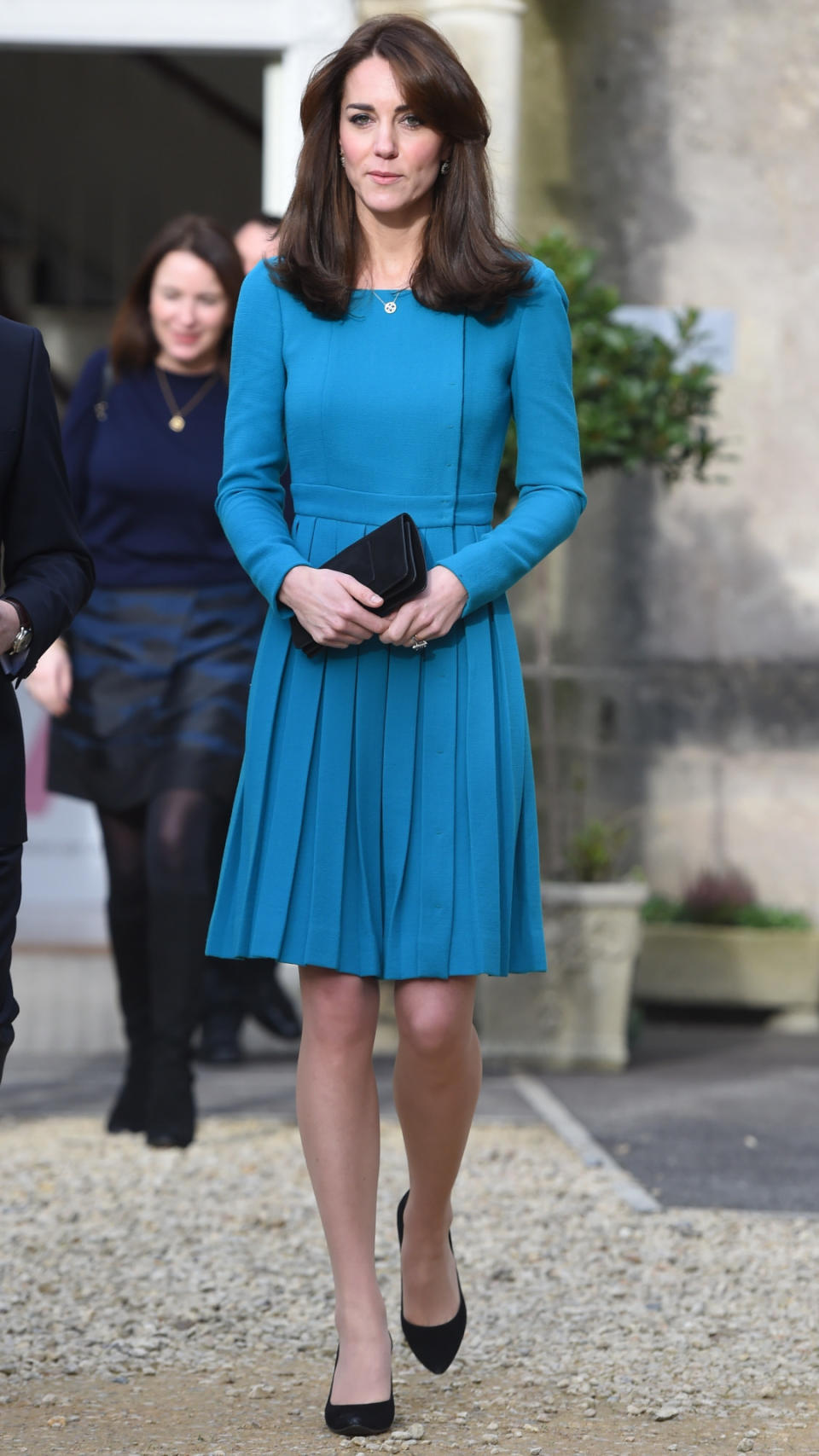 <p>On a charity visit, Kate wore a bespoke teal Emilia Wickstead dress with pleated skirt. She carried her prized Mulberry bag and finished with a pair of Stuart Weitzman heels. </p><p><i>[Photo: PA]</i></p>