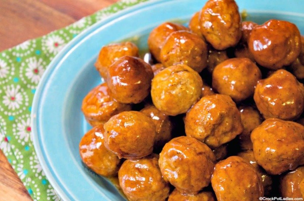 <p>Crock Pot Ladies</p><p>These sweet and spicy meatballs are Weight Watchers friendly too.</p><p><strong>Get the recipe:<a href="https://crockpotladies.com/crock-pot-honey-buffalo-meatballs/" rel="nofollow noopener" target="_blank" data-ylk="slk:Crock Pot Honey Buffalo Meatballs;elm:context_link;itc:0;sec:content-canvas" class="link rapid-noclick-resp"> Crock Pot Honey Buffalo Meatballs</a></strong></p>