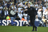 Newcastle's head coach Eddie Howe throws the ball as he leaves the field at the end of the English Premier League soccer match between Leeds United and Newcastle United at Elland Road in Leeds, England, Saturday, May 13, 2023. The match ended tied 2-2. (AP Photo/Rui Vieira)