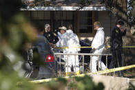 <p>Law enforcement and forensic officials gather near the First Baptist Church. County Sheriff Joe D. Tackitt said: ‘We need your support,’<br>‘And media, don’t blow it out there that it should have never happened, because it does happen. And we sincerely feel sorry for all the people who are involved.’ (Erich Schlegel/Getty Images) </p>