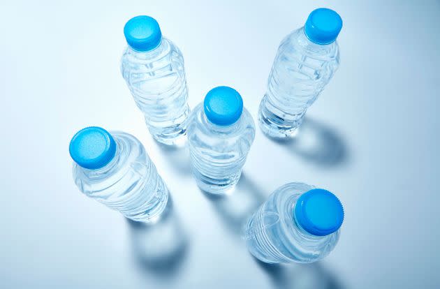Some experts are sounding the alarm about bottled water and potential contaminants. (Photo: Adam Gault via Getty Images)