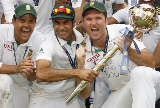 Imran Tahir (centre), Graeme Smith (right) and Jacques Rudolph celebrate with the ICC World Test Mace at Lord's in August after South Africa replaced England as the number one Test cricket side