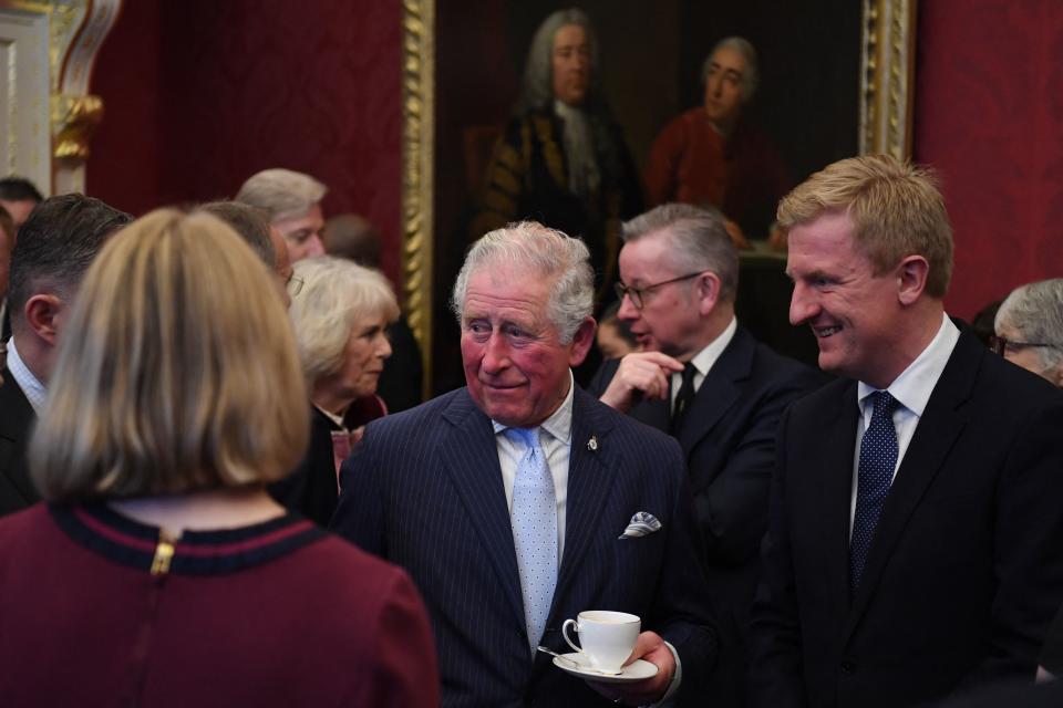 Britain's Prince Charles, Prince of Wales, (C) with Britain's newly appointed Secretary of State for Digital, Culture, Media and Sport Oliver Dowden (R) attends a reception in the Stone Hall during a tour of the Cabinet Office in central London on February 13, 2020. - Their Royal Highnesses toured the Cabinet Office building to recognise the work it undertakes on behalf of the government. The Cabinet Office supports the Prime Minister and ensure the effective running of government. It is also the corporate headquarters for government, in partnership with HM Treasury, and takes the lead in certain critical policy areas. (Photo by Daniel LEAL / POOL / AFP) (Photo by DANIEL LEAL/POOL/AFP via Getty Images)