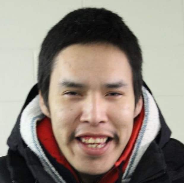 Shawn Moostoos was wanted in connection with a shooting on the James Smith First Nation. Police found him at a home in Melfort, Sask., on Monday afternoon. (RCMP - Handout - image credit)