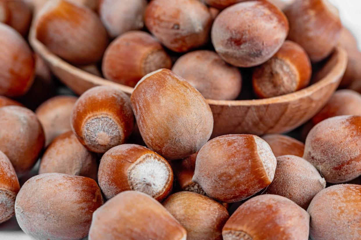 Whole hazelnuts with shell background