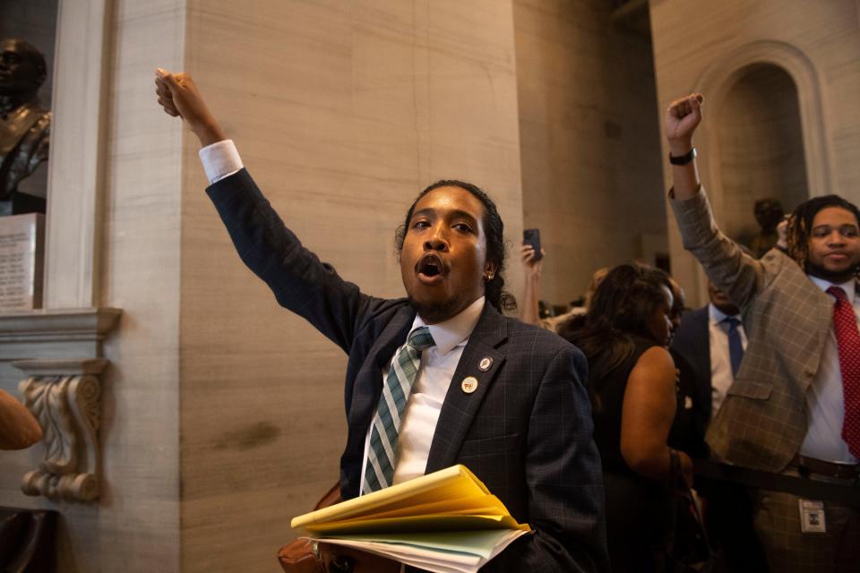 Rep. Justin Jones, D-Nashville, cheers with supporters after House republicans voted to silence Rep. Justin Jones, D-Nashville, during the special legislative session on public safety in Nashville, Tenn., on Monday, August 28, 2023.