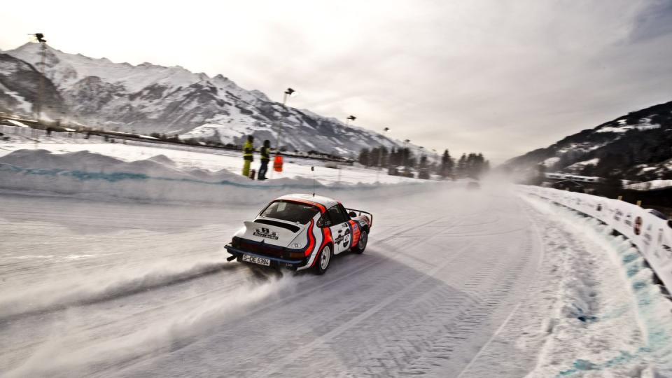 a race car on a snowy road