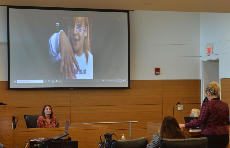 Kimber Sigua, cousin of Amber Woods, watches a video Amber shot of herself in January 2006, shortly after Ralph Williams bought her an engagement ring. Ralph Williams brother, Tyjuan Williams, 35, is on trial for his connection to the murder of 16-year-old Amber Woods, whose body was found on the side of a rural Manatee County road in 2006.