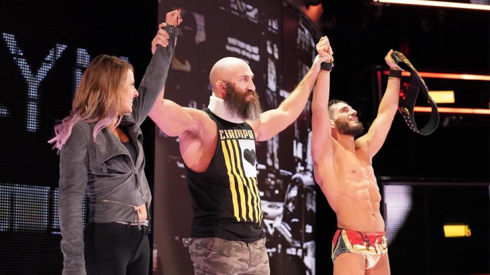 Tommaso Ciampa celebrates with Johnny Gargano and Candice LeRae during NXT TakeOver: New York. (Photo courtesy of WWE)