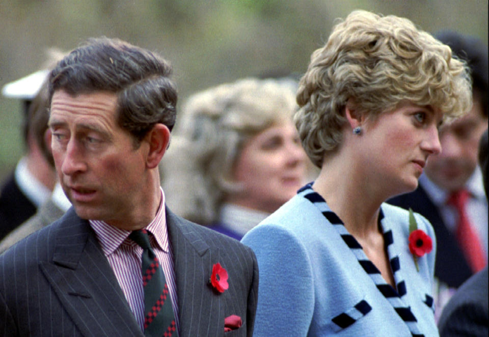 Princess Diana and Prince Charles look in different directions, November 3, during a service held to commemorate the 59 British soldiers killed in action during the Korean War.