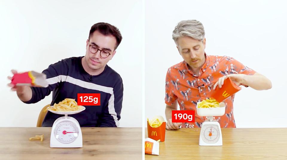 Harry Kersh (L) and Joe Avella (R) measure large fries from a UK and US McDonald's.