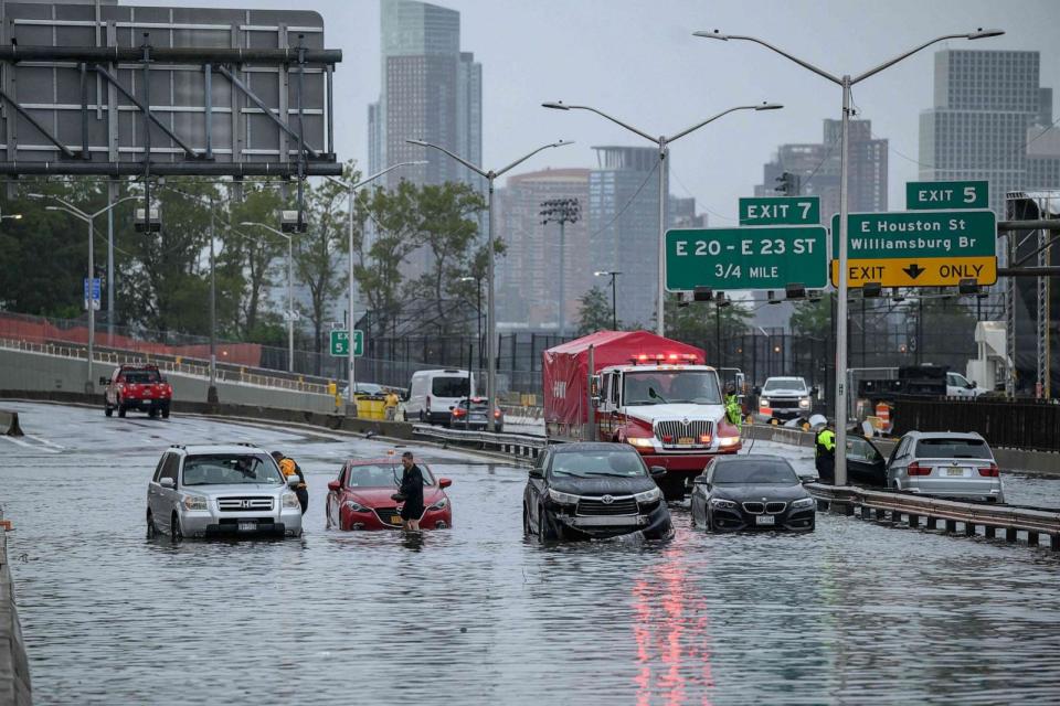 PHOTO: Cars in floodwater on the FDR highway in Manhattan, New York, Sept. 29, 2023. (Ed Jones/AFP via Getty Images)