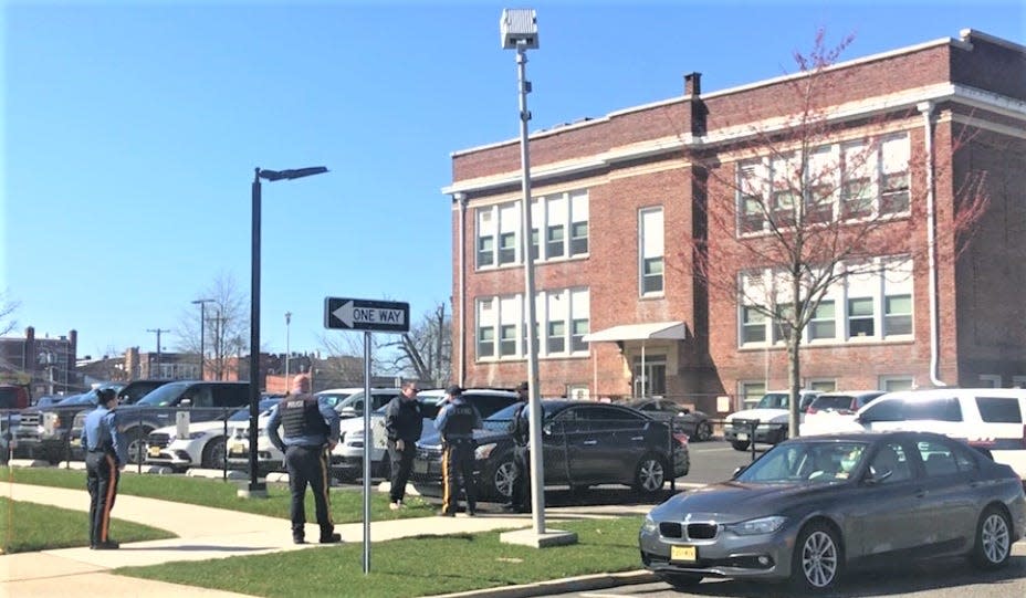 Police question a barefoot Robert Romano, former mayor of Vineland, near his car at the City Hall parking lot on Plum Street Monday morning. Romano, 71, a retired officer, then was charged with drunk driving and reckless driving charges. PHOTO: March 25, 2024.