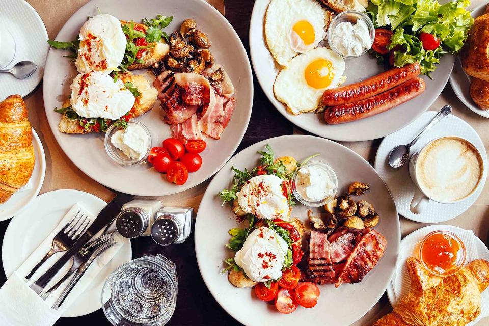 <p>Alexander Spatari / Getty Images</p> A brunch spread