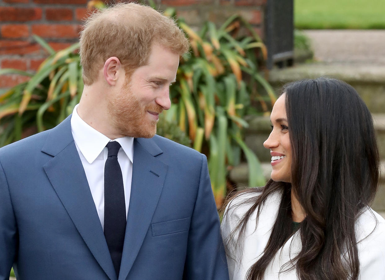 Prince Harry and Meghan Markle during an official photocall to announce their engagement [Photo: Getty]