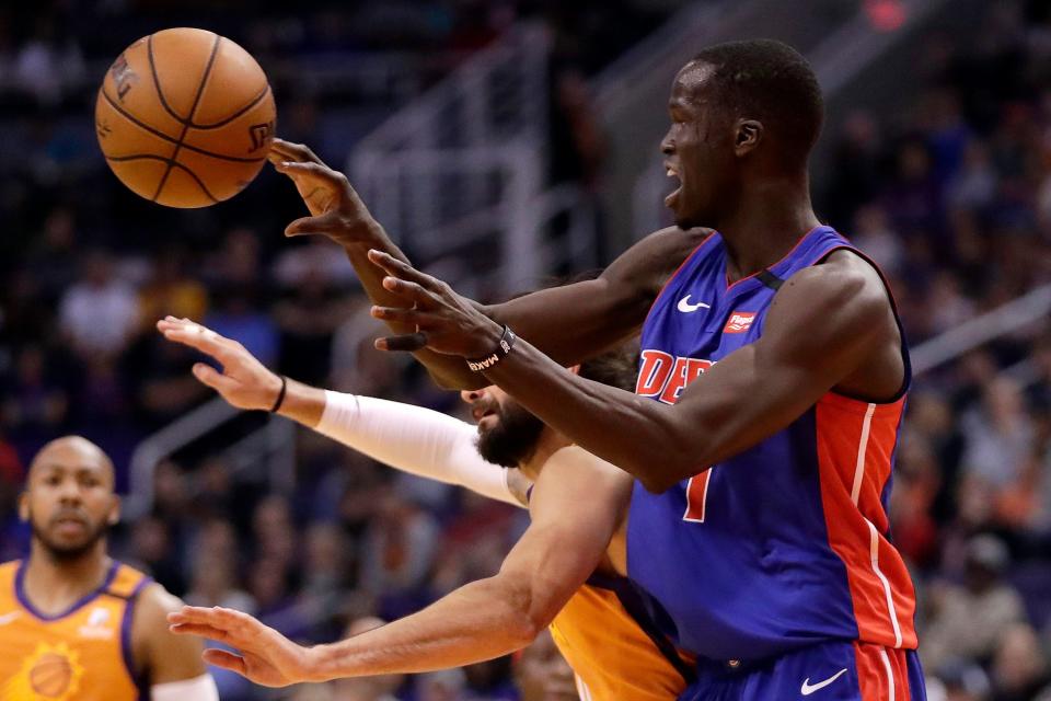 Detroit Pistons forward Thon Maker passes during the first half against the Phoenix Suns, Friday, Feb. 28, 2020, in Phoenix.