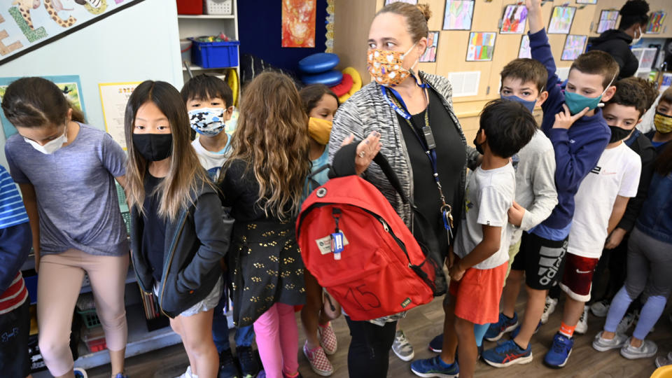 Third grade students in Mrs. Jordan's class prepare to exit their classroom in orderly fashion as they participate in the Great Shakeout at Pacific Elementary School in Manhattan Beach on Thursday, October 21, 2021. (Brittany Murray/MediaNews Group/Long Beach Press-Telegram via Getty Images)
